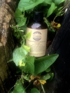 Citrus sage hair and body oil bottle image